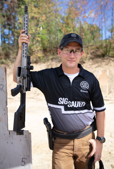 Team SIG Shooter Daniel Horner with his M400 SDI Comp rifle with a TANGO6 1-6x24mm first focal plane riflescope