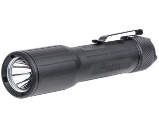 "Unveiling the Sig Sauer FOXTROT-EDC FULL-SIZE, a formidable beacon of light captured in this image. This full-size tactical flashlight showcases the relentless commitment to excellence that defines Sig Sauer. With a robust design and powerful illuminatio