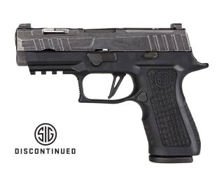 The P320-XCompact spectre features: Laser Engraved LXG XCompact Grip Module, Custom Works Spectre slide with a distressed finish, X flat skeleton trigger, xray3 Day/Night sights.