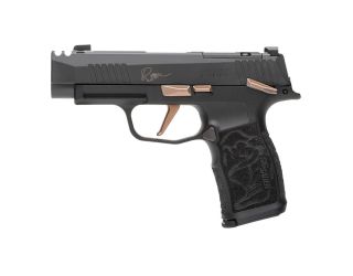 "Presenting the Sig Sauer P365-XL COMP ROSE Pistol, a sophisticated blend of precision and elegance captured in this image. The P365-XL COMP ROSE edition features rose gold accents, adding a touch of refinement to its extended frame design."