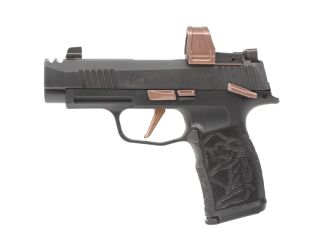 "Introducing the Sig Sauer P365-XL ROSE COMP ROMEOZERO ELITE pistol, a pinnacle of performance and sophistication captured in this image. The P365-XL ROSE edition seamlessly combines the extended features of the XL series with the elegance of rose gold ac