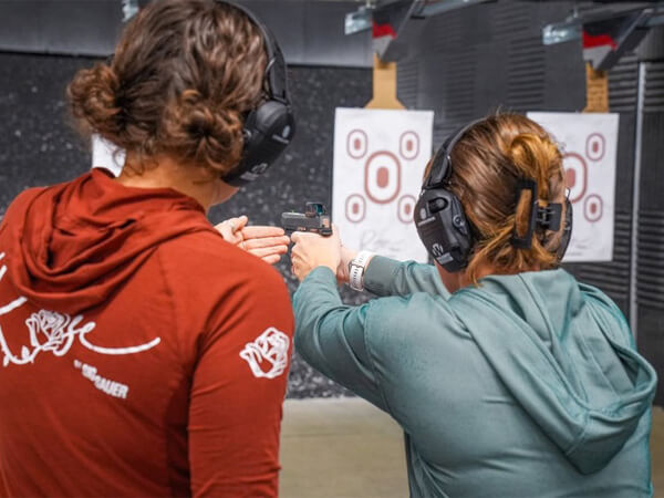 Lena Miculek Instructs Attendees at the Range