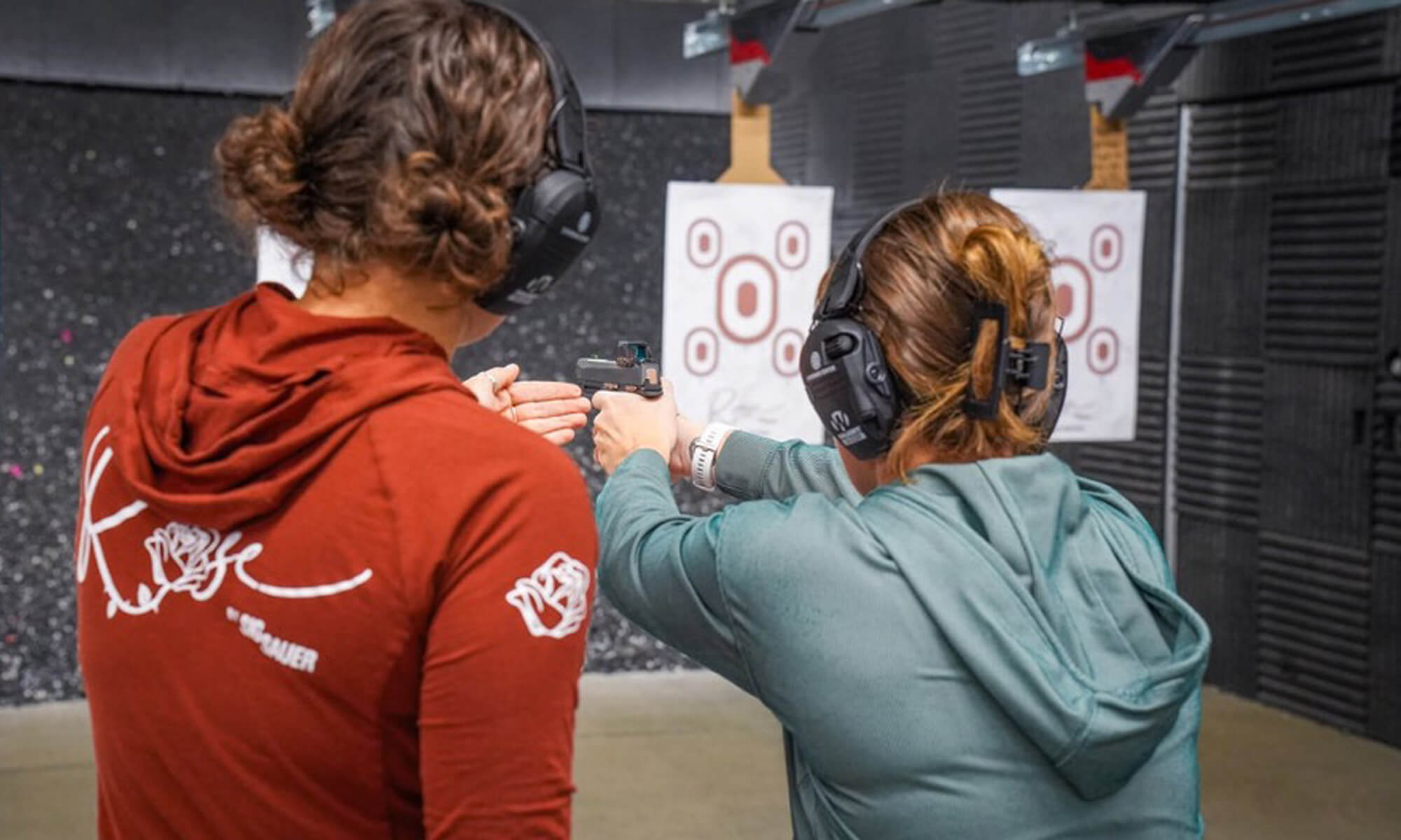 Lena Miculek Instructs Attendees at the Range