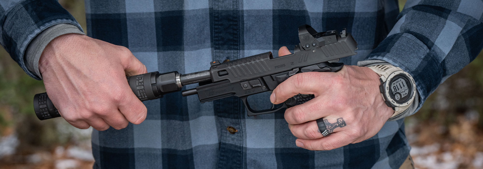 SIG SAUER P226 pistol and optics mounted additional slide.