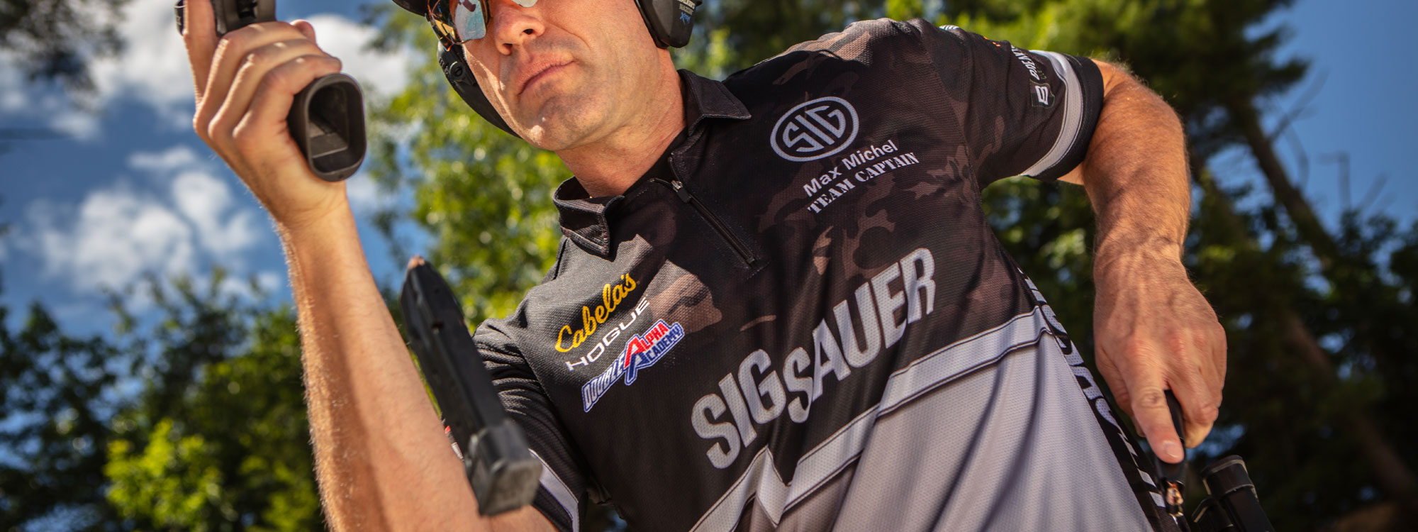 Team SIG Captain Max Michel in the middle of a magazine reload.