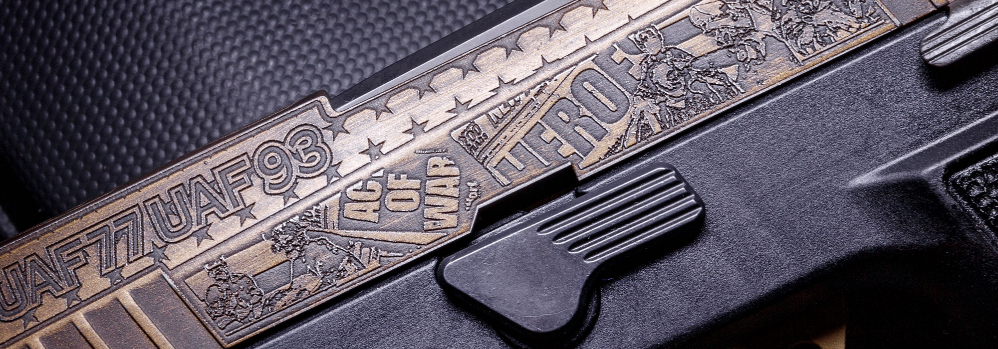 Guns & Ammo/SIG SAUER P320 FCU “Never Forget 9/11 Tribute” Pistol side view engravings close up