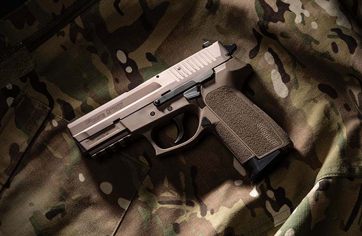 The SIG P2022 pistol in coyote tan.